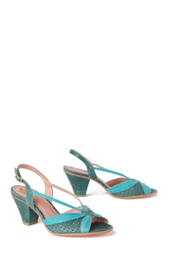 Tonal straps stretch like butterfly wings across the pe