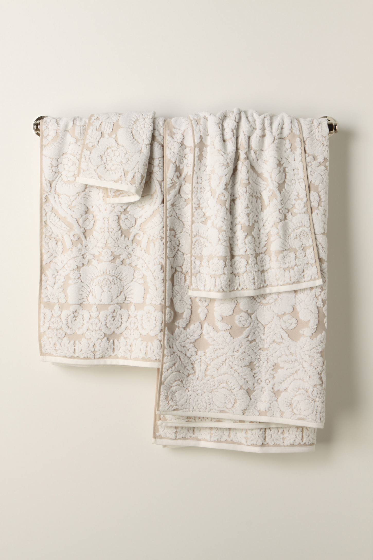 Rose tapestry pattern towels hanging