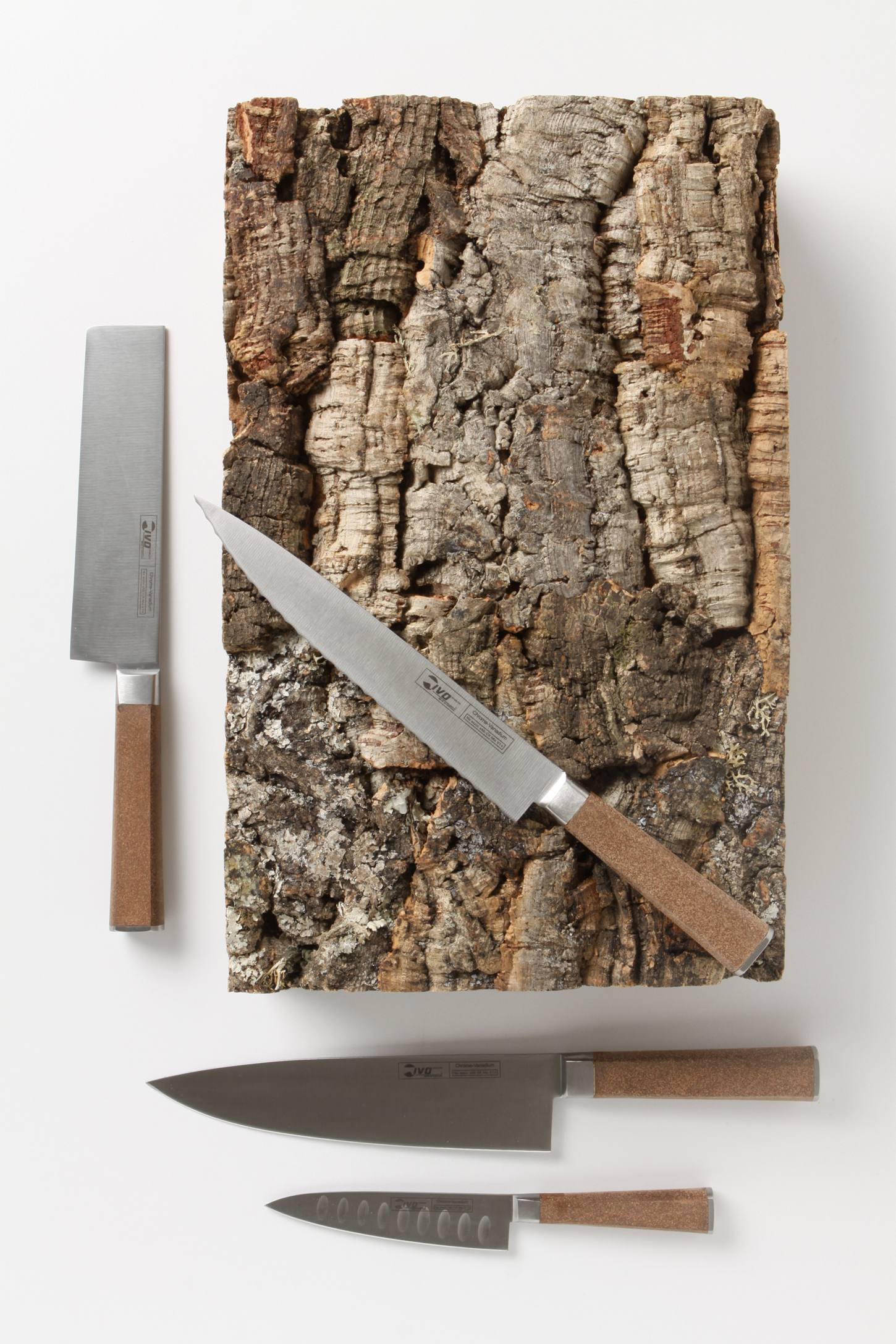 Cork knife set with piece of cork to hold knives