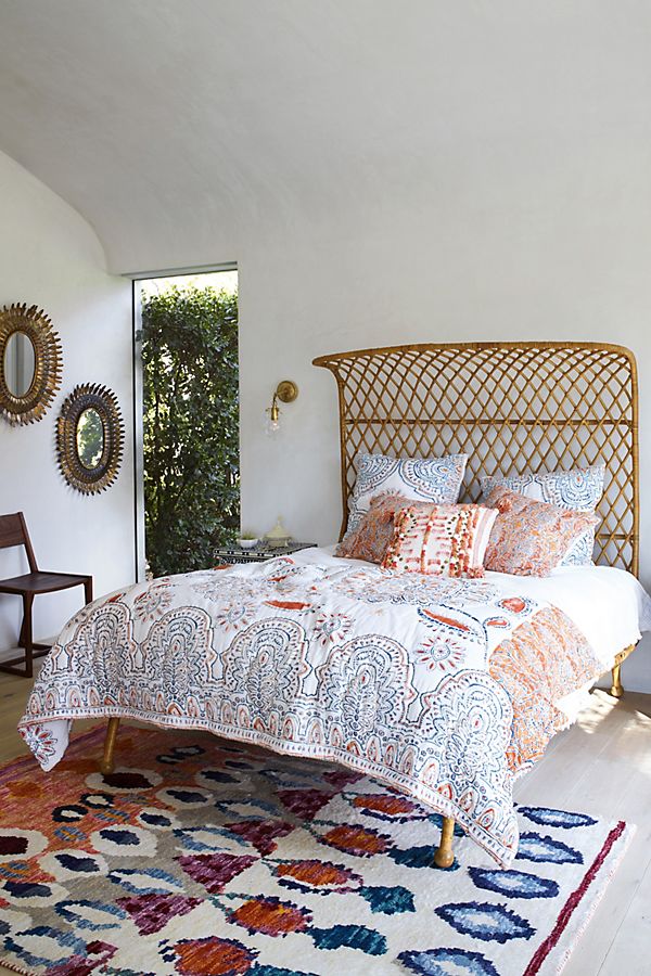 curved rattan bed | anthropologie