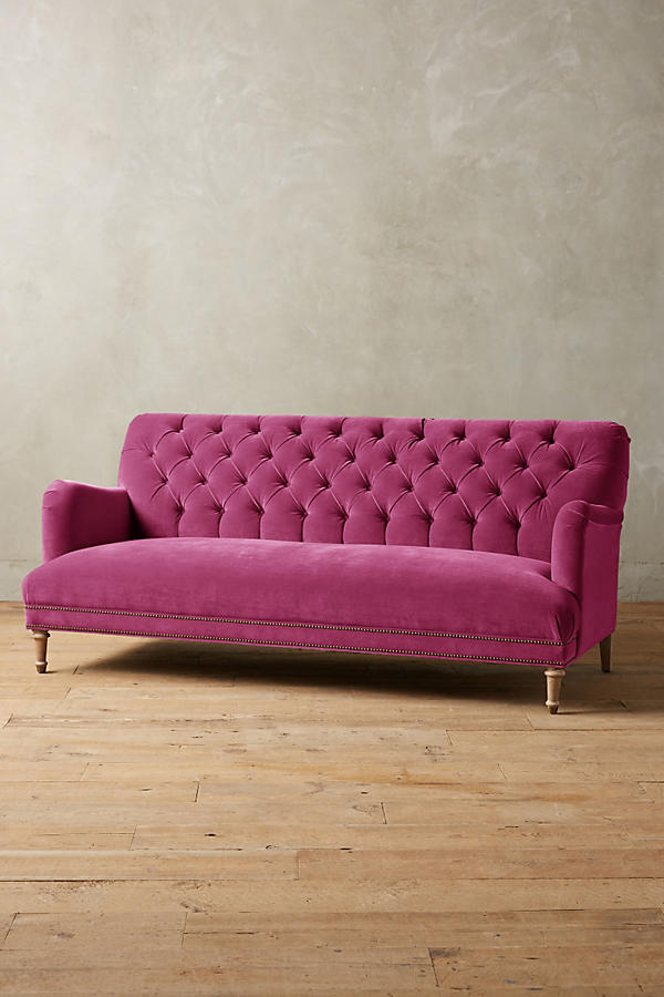 Hot pink velvet sofa