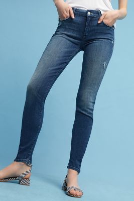 Mother - Looker Distressed Mid-rise Skinny Jeans - Light denim ...