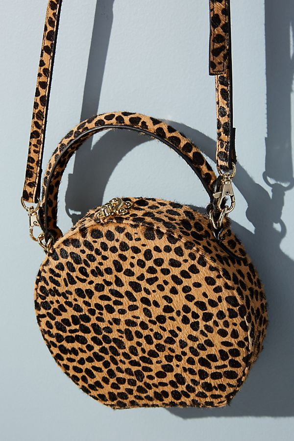 Slide View: 1: Circular Leopard-Print Crossbody Bag